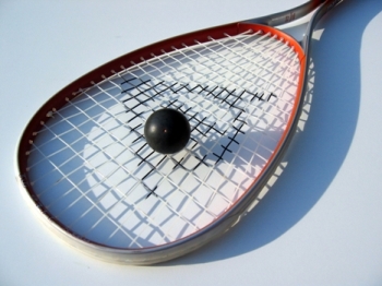 This photo of a racquetball racquet and ball (smaller than a squash ball) was taken by Matthew Green of Johannesburg, South Africa.